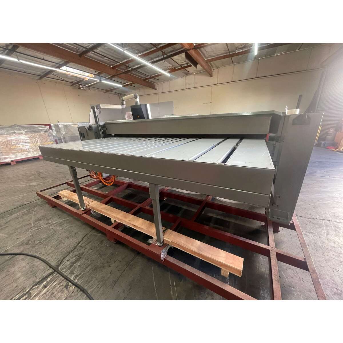 Side view of EFM-1014CNC Flatbed Table Machine
