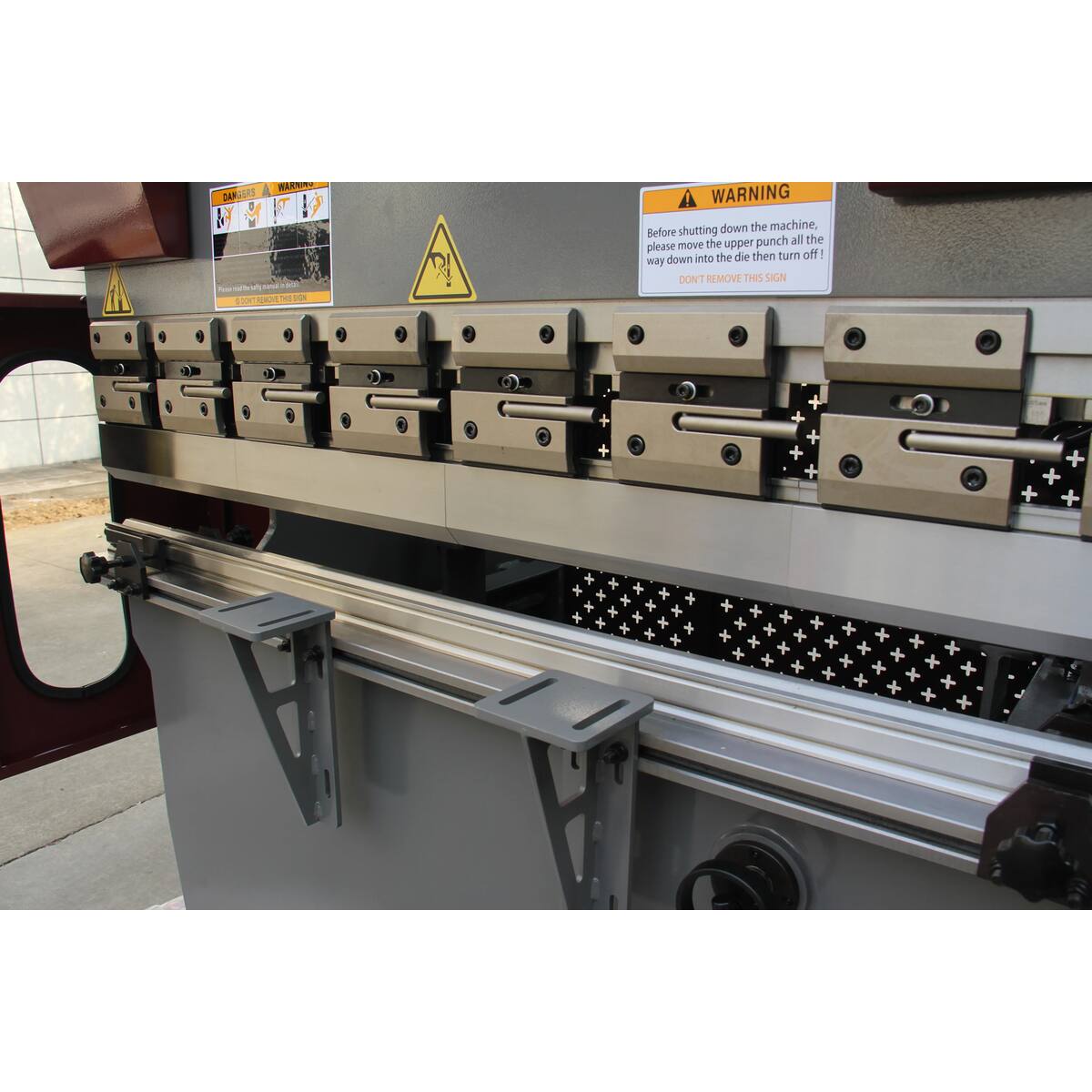 Close-up view of Press brake clamps